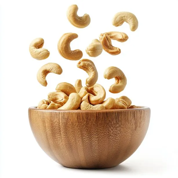 Whole W180 cashews in a white bowl